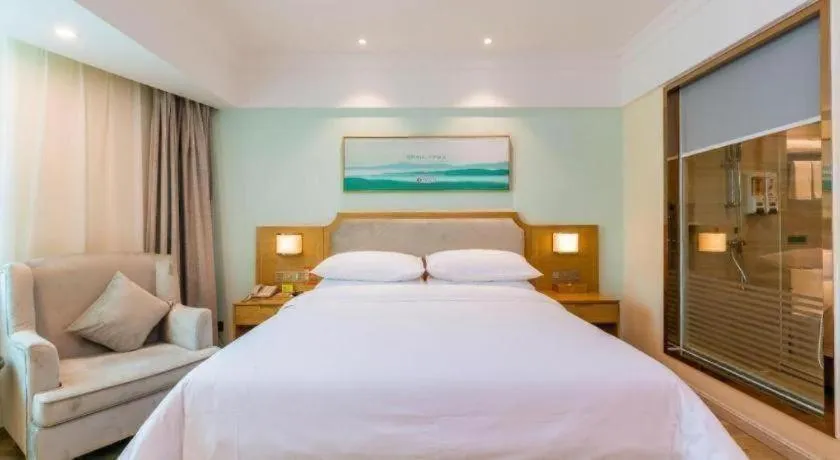 Bed in Vienna Hotel Guangdong Foshan Shunde Longjiang Material City