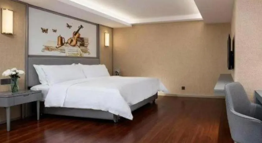 Bed in Vienna Hotel Guangdong Foshan West Station Airport Luocun