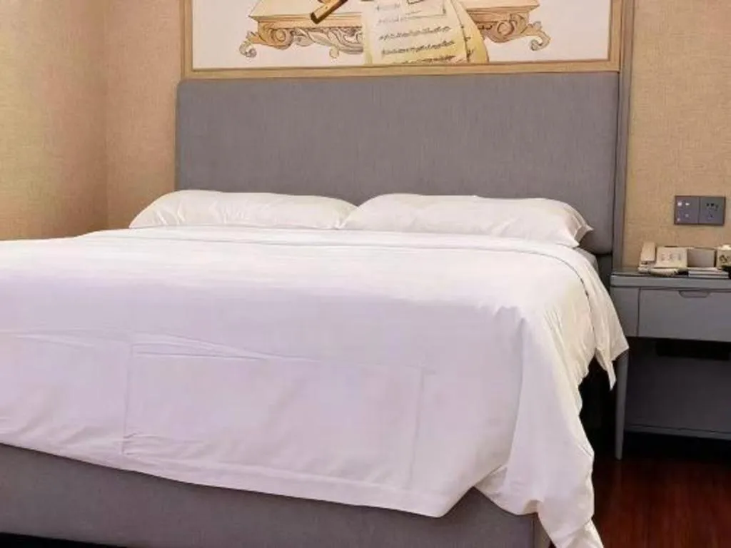 Bed in Vienna Hotel Guangdong Foshan West Station Airport Luocun