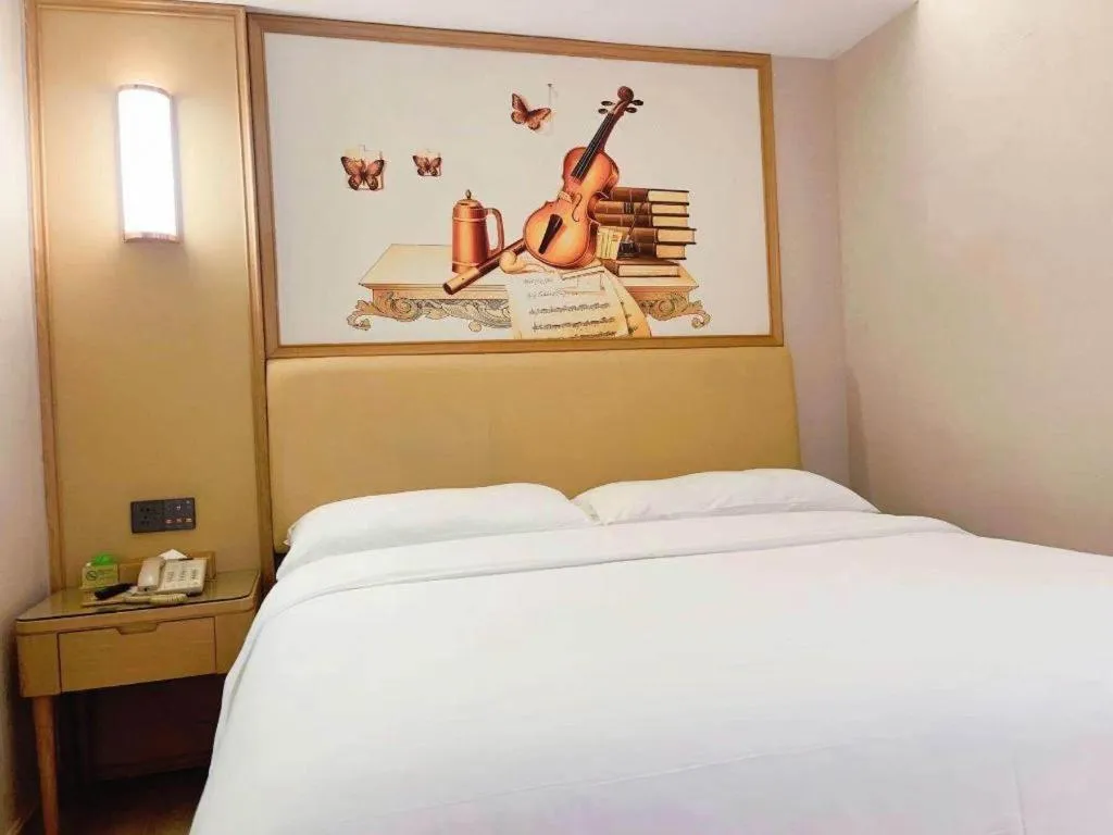 Bed in Vienna Hotel Guangdong Foshan West Station Airport Luocun