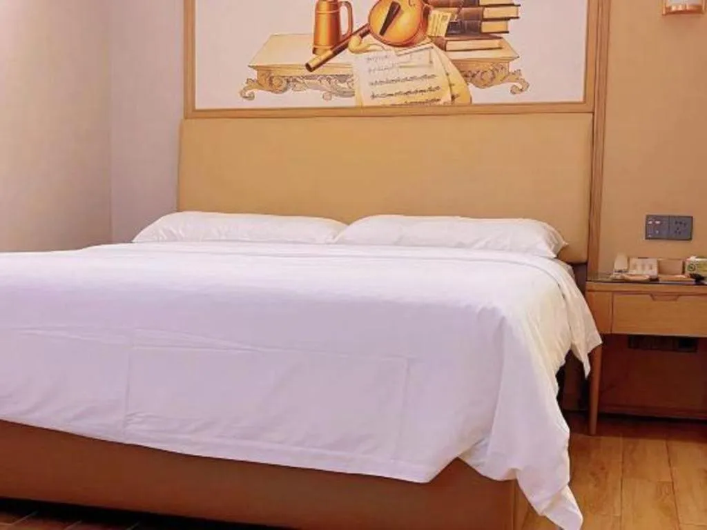 Bed in Vienna Hotel Guangdong Foshan West Station Airport Luocun
