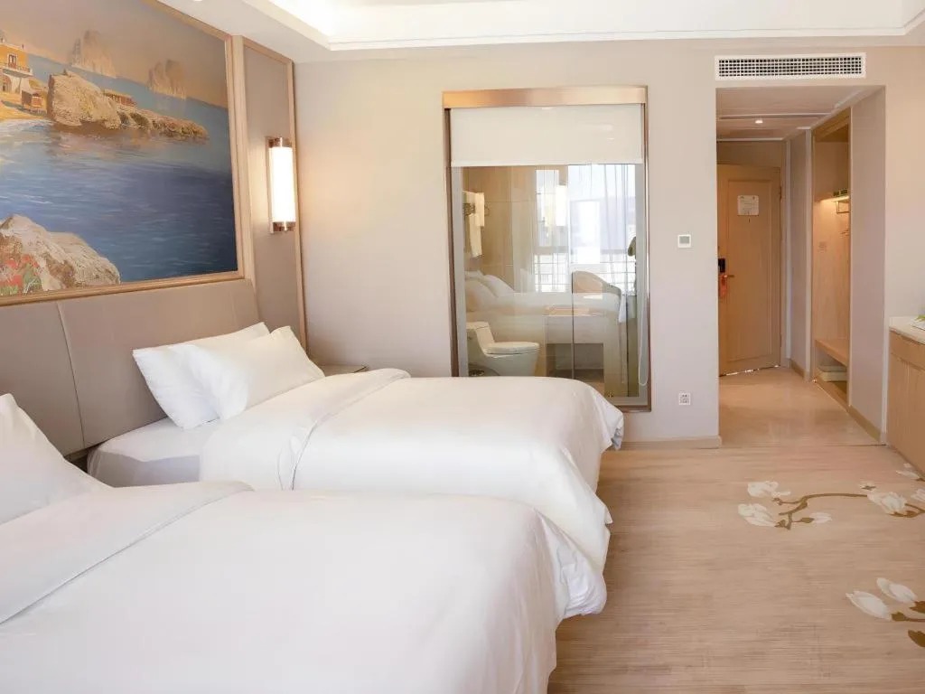 Bed in Vienna Hotel Yunnan Dali Erhai Lake