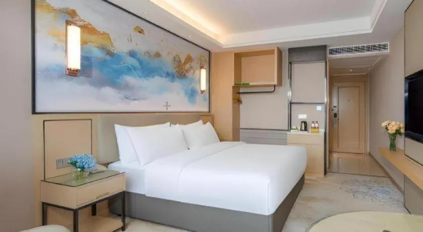 Bed in Vienna Hotel Yunnan Dali Erhai Lake