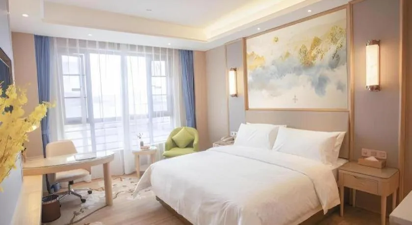 Bed in Vienna Hotel Yunnan Dali Erhai Lake