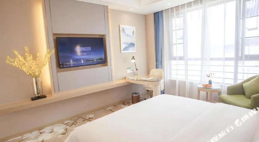 Bed in Vienna Hotel Yunnan Dali Erhai Lake