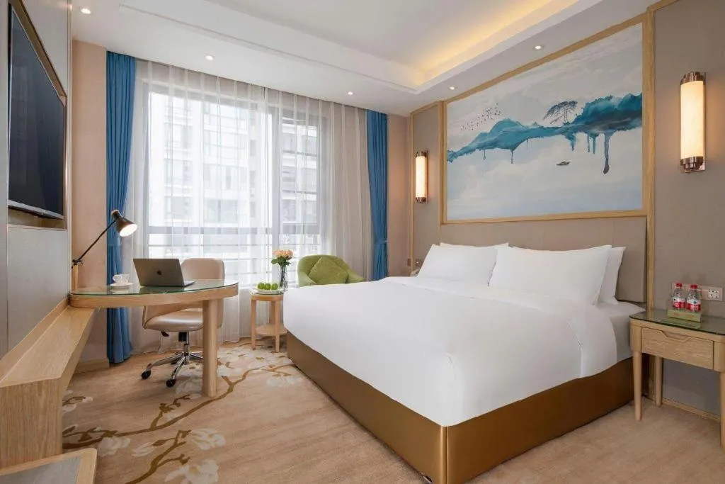 Bed in Vienna Hotel Yunnan Dali Erhai Lake