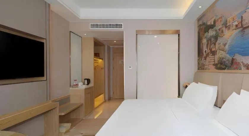 Bed in Vienna Hotel Yunnan Dali Erhai Lake