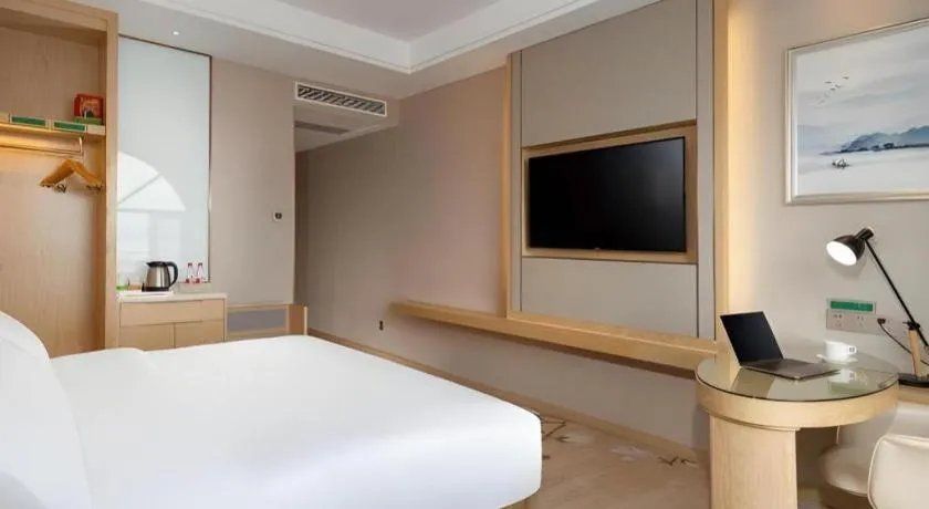 Bed in Vienna Hotel Yunnan Dali Erhai Lake