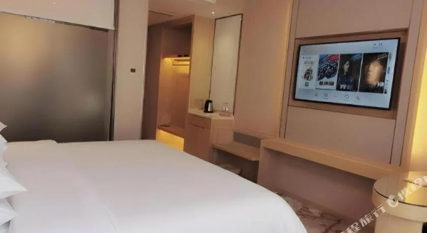 Bed in Vienna Hotel Yunnan Dali Erhai Lake