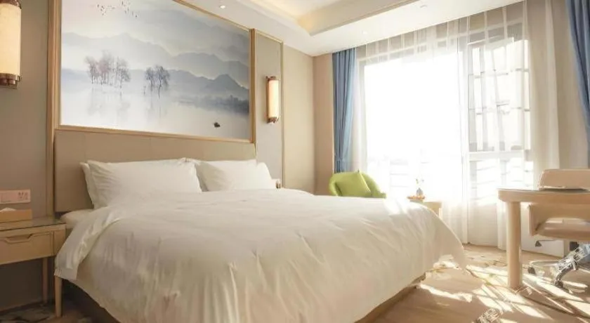 Bed in Vienna Hotel Yunnan Dali Erhai Lake