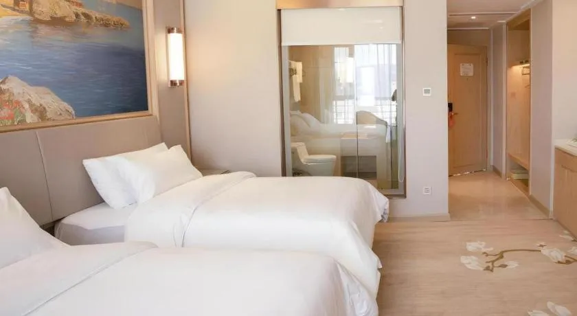 Bed in Vienna Hotel Yunnan Dali Erhai Lake