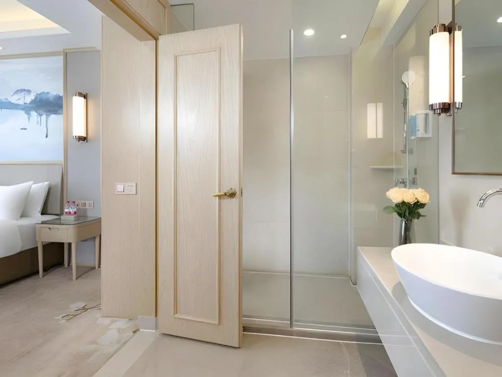 Bed in Vienna Hotel Yunnan Dali Erhai Lake