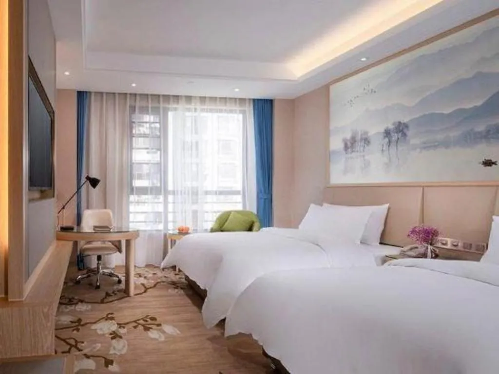 Bed in Vienna Hotel Yunnan Dali Erhai Lake