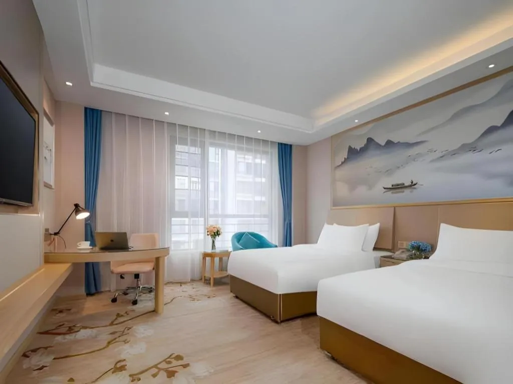 Bed in Vienna Hotel Yunnan Dali Erhai Lake