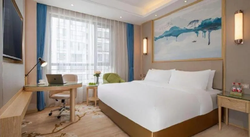 Bed in Vienna Hotel Yunnan Dali Erhai Lake