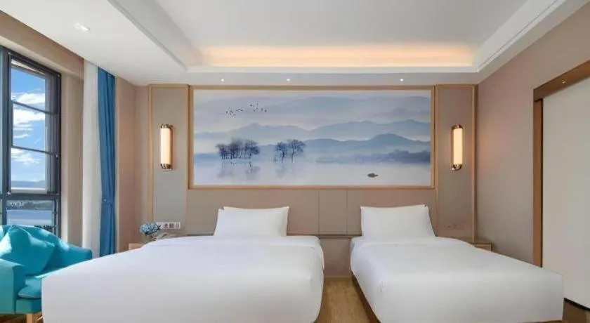 Bed in Vienna Hotel Yunnan Dali Erhai Lake