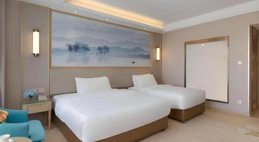 Bed in Vienna Hotel Yunnan Dali Erhai Lake