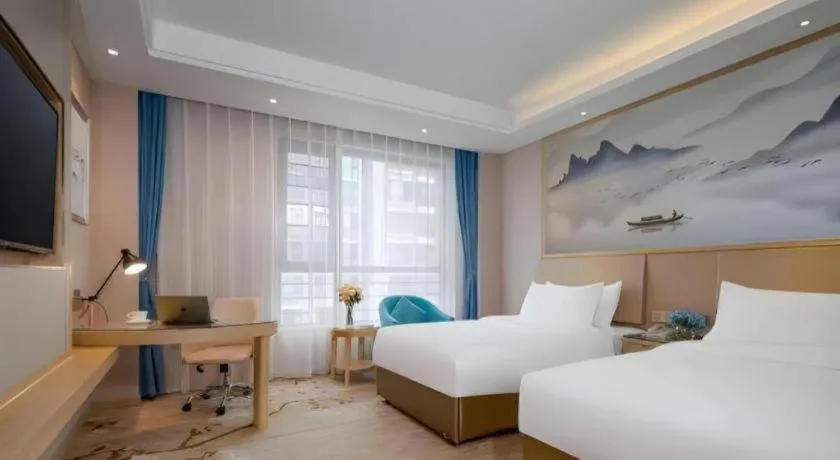 Bed in Vienna Hotel Yunnan Dali Erhai Lake