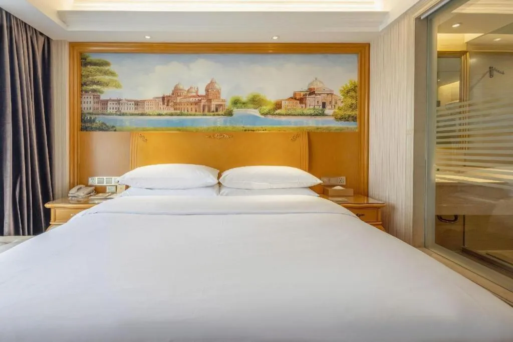 Bed in Vienna Hotel Kunming Beijing Road Chuanxin Gulou Metro Station