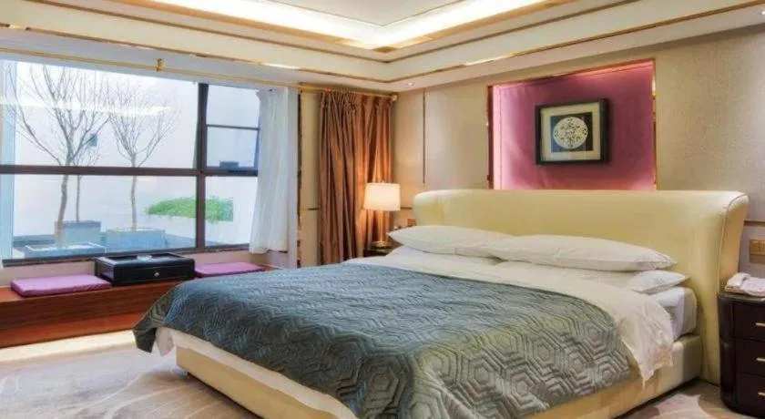 Bed in Vienna Hotel Kunming Beijing Road Chuanxin Gulou Metro Station