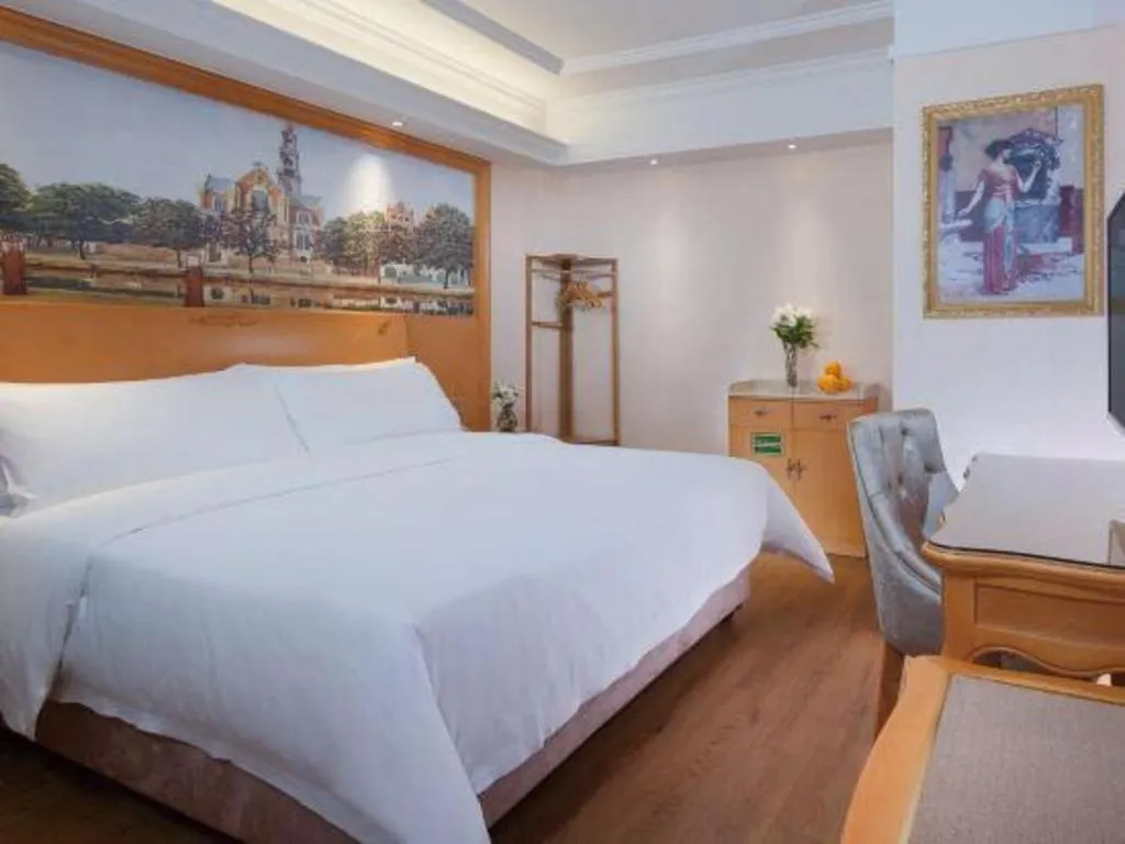 Bed in Vienna Hotel Kunming Beijing Road Chuanxin Gulou Metro Station