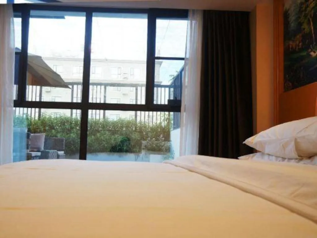 Bed in Vienna Hotel Kunming Beijing Road Chuanxin Gulou Metro Station