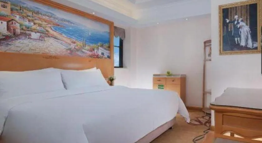 Bed in Vienna Hotel Kunming Beijing Road Chuanxin Gulou Metro Station