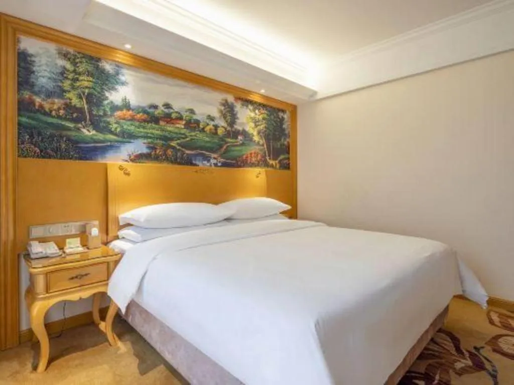 Bed in Vienna Hotel Kunming Beijing Road Chuanxin Gulou Metro Station