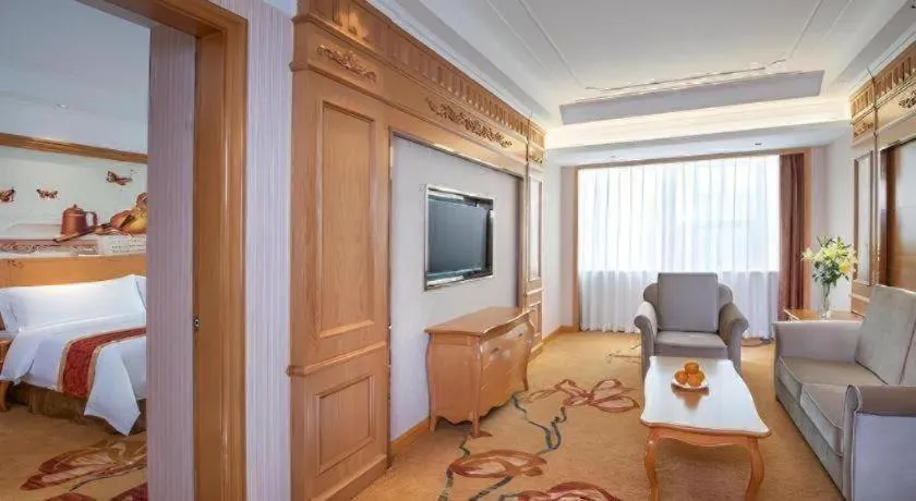 Bed in Vienna Hotel Ganzhou Economic Development Zone 1st Hospital West High-Speed Railway Station