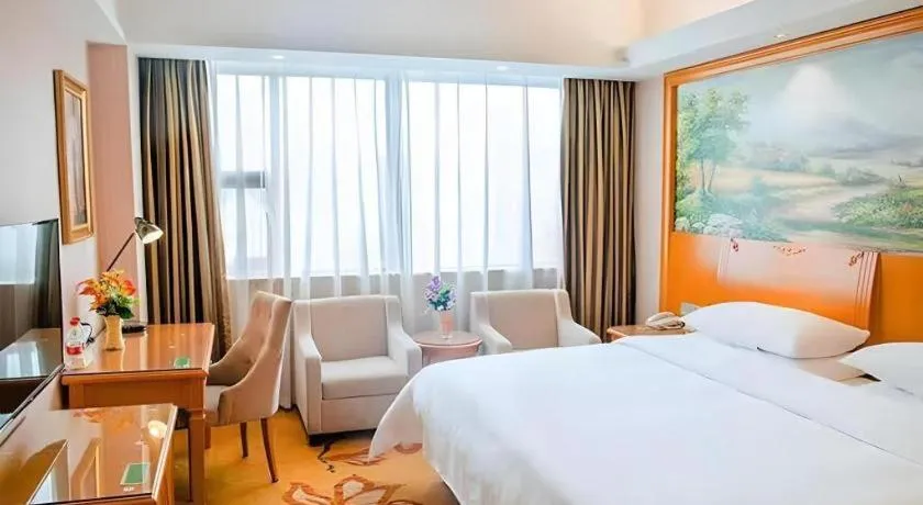 Bed in Vienna Hotel Ganzhou Economic Development Zone 1st Hospital West High-Speed Railway Station