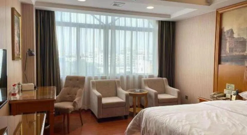 Bed in Vienna Hotel Ganzhou Economic Development Zone 1st Hospital West High-Speed Railway Station