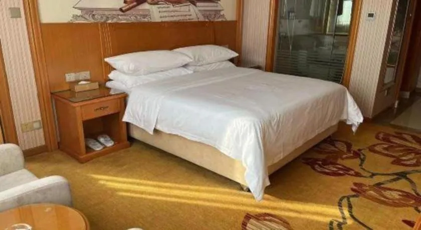 Bed in Vienna Hotel Ganzhou Economic Development Zone 1st Hospital West High-Speed Railway Station