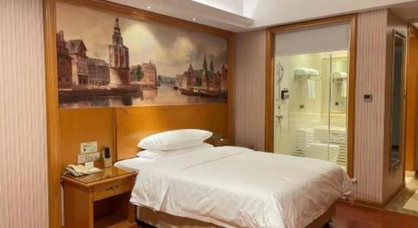 Bed in Vienna Hotel Ganzhou Economic Development Zone 1st Hospital West High-Speed Railway Station