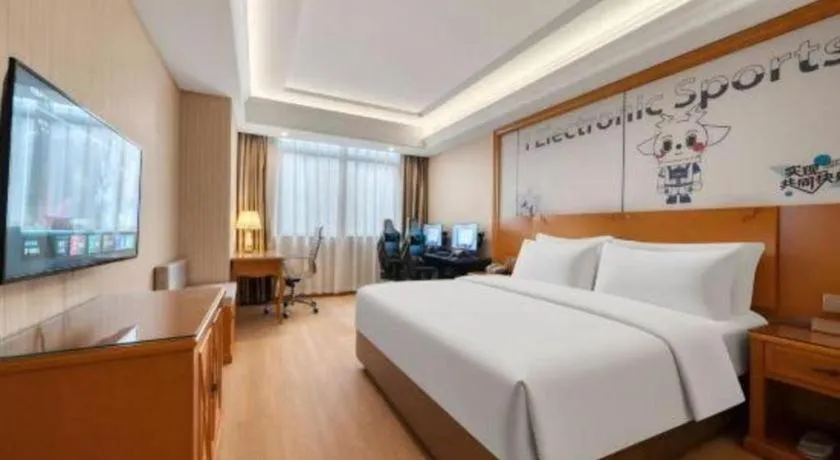 Bed in Vienna Hotel Shanghai Hongqiao National Exhibition Cente Sijing Metro Station