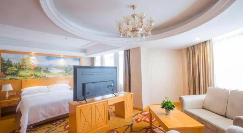 Bed in Vienna Hotel Shanghai Hongqiao National Exhibition Cente Sijing Metro Station