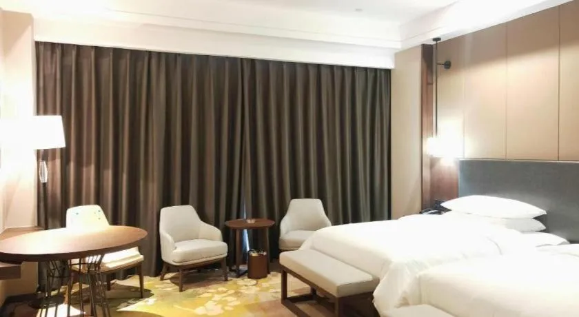 Bed in Venus Royal Hotel Ordos Yijinhuoluo Banner Olympic