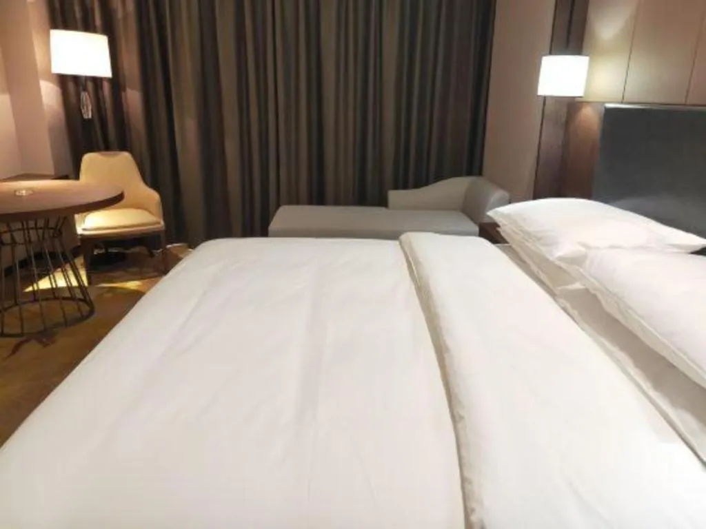 Bed in Venus Royal Hotel Ordos Yijinhuoluo Banner Olympic