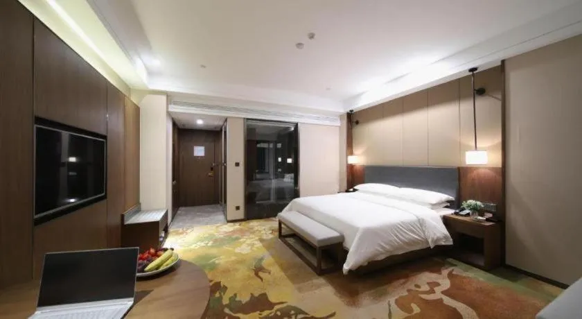 Bed in Venus Royal Hotel Ordos Yijinhuoluo Banner Olympic