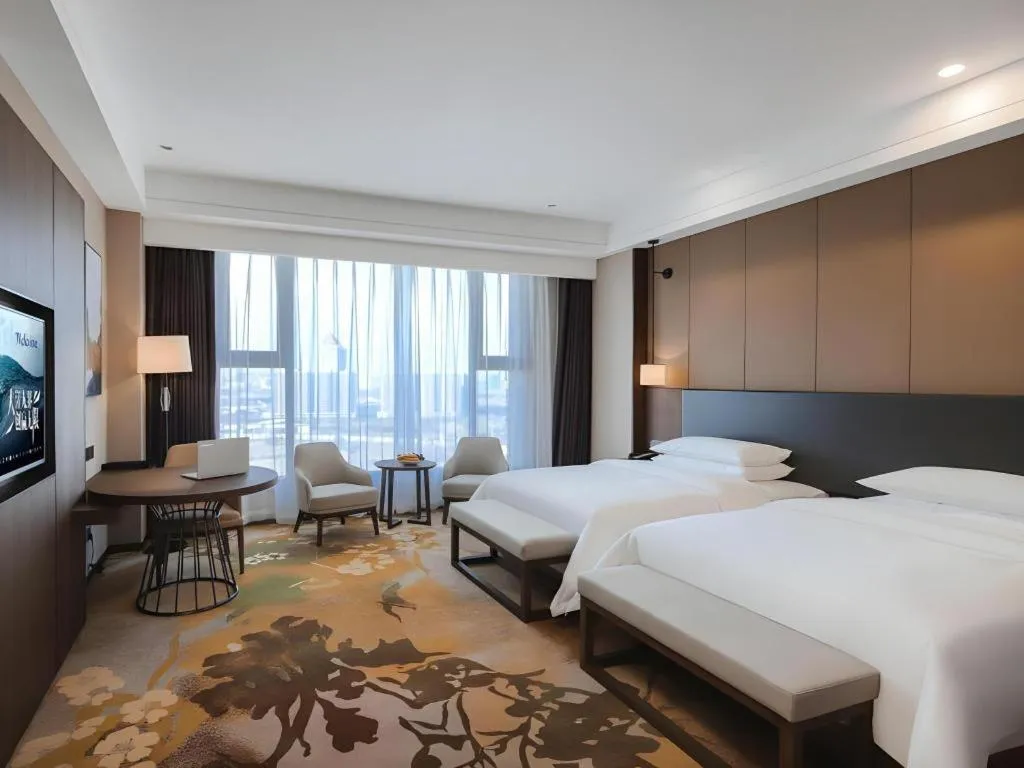 Bed in Venus Royal Hotel Ordos Yijinhuoluo Banner Olympic