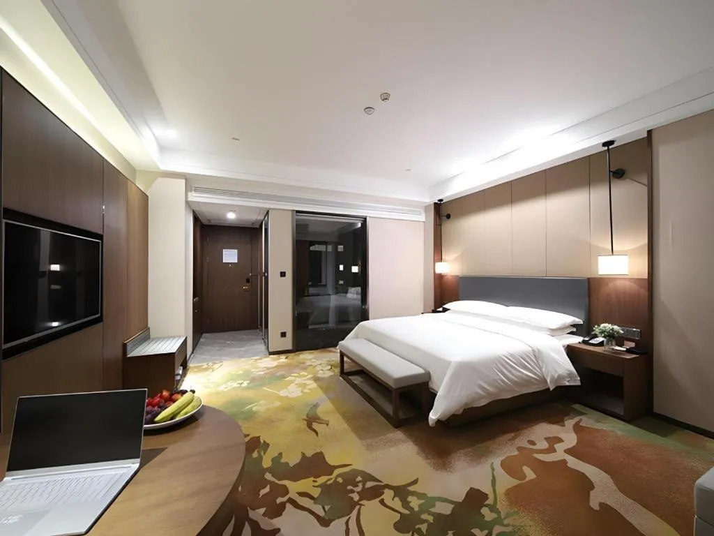 Bed in Venus Royal Hotel Ordos Yijinhuoluo Banner Olympic