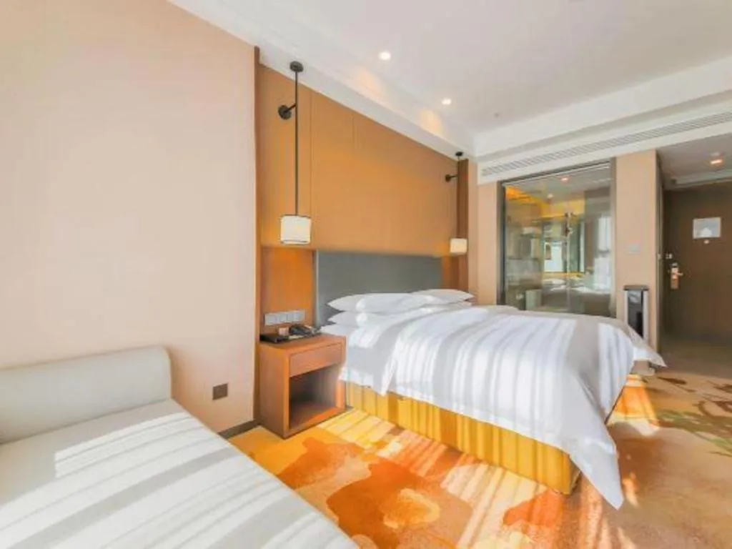 Bed in Venus Royal Hotel Ordos Yijinhuoluo Banner Olympic