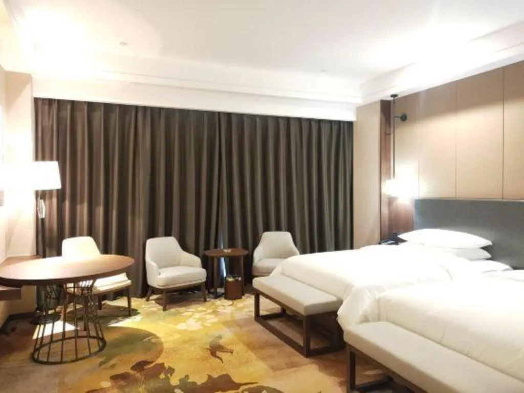 Bed in Venus Royal Hotel Ordos Yijinhuoluo Banner Olympic