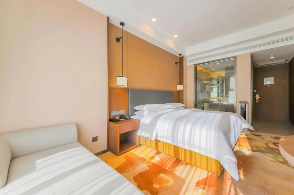 Bed in Venus Royal Hotel Ordos Yijinhuoluo Banner Olympic