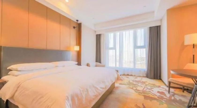 Bed in Venus Royal Hotel Ordos Yijinhuoluo Banner Olympic