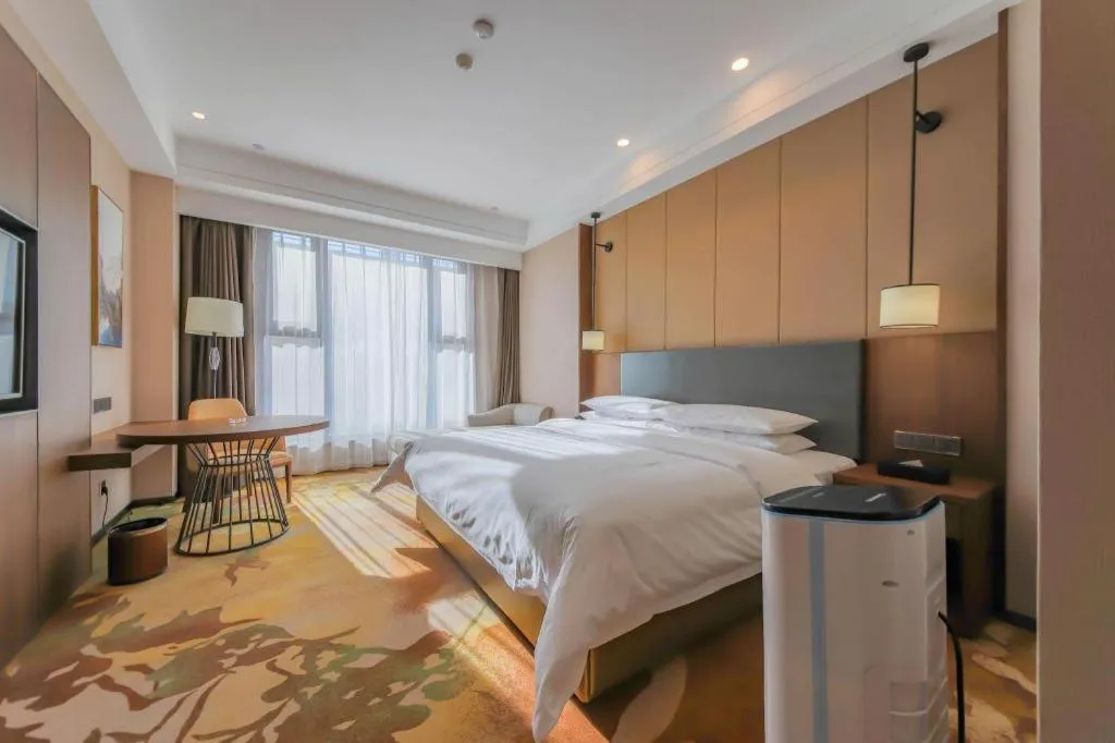 Bed in Venus Royal Hotel Ordos Yijinhuoluo Banner Olympic