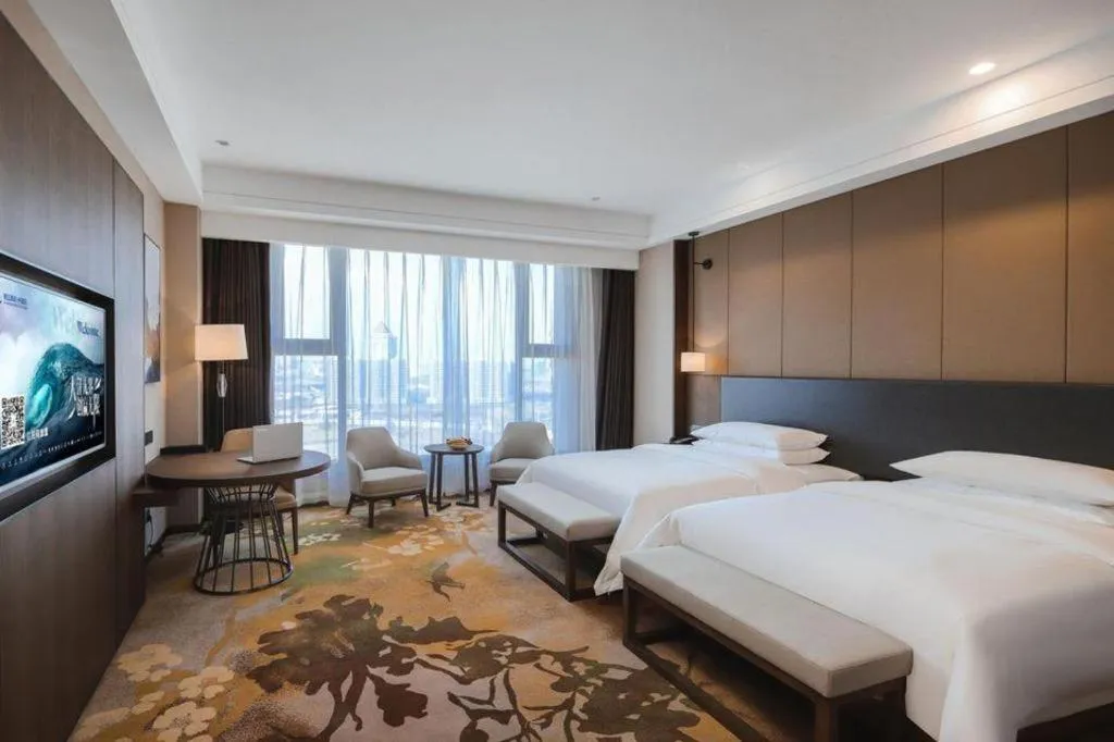 Bed in Venus Royal Hotel Ordos Yijinhuoluo Banner Olympic