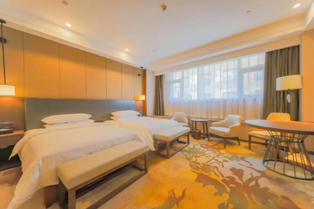 Bed in Venus Royal Hotel Ordos Yijinhuoluo Banner Olympic