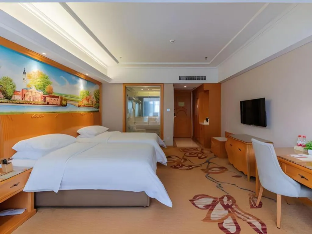 Bed in Vienna Hotel Guangdong Shaoguan Renhua Danxiashan County Center