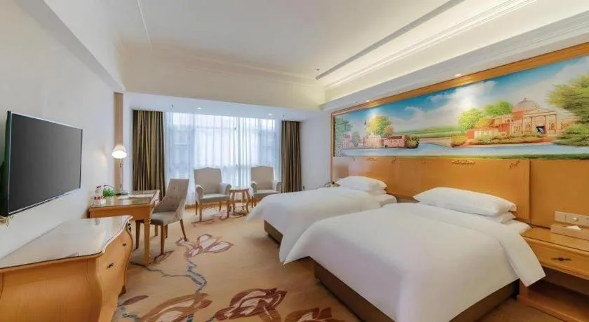 Bed in Vienna Hotel Guangdong Shaoguan Renhua Danxiashan County Center