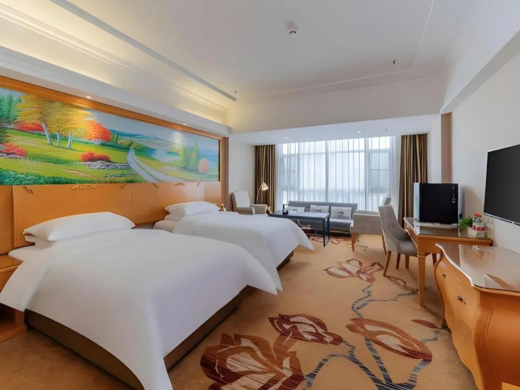 Bed in Vienna Hotel Guangdong Shaoguan Renhua Danxiashan County Center